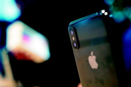 苹果市值 逼近1兆美元