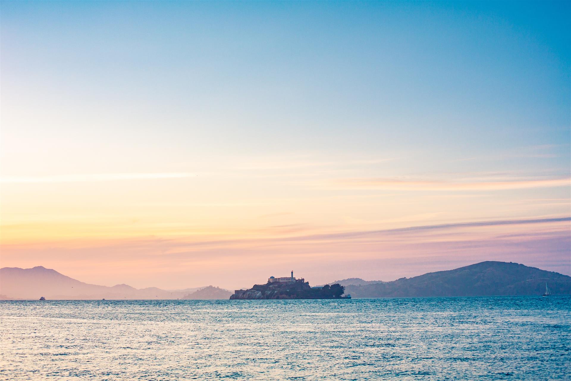 Lonely Alcatraz Island in The Middle of San Francisco Bay Free Image Download